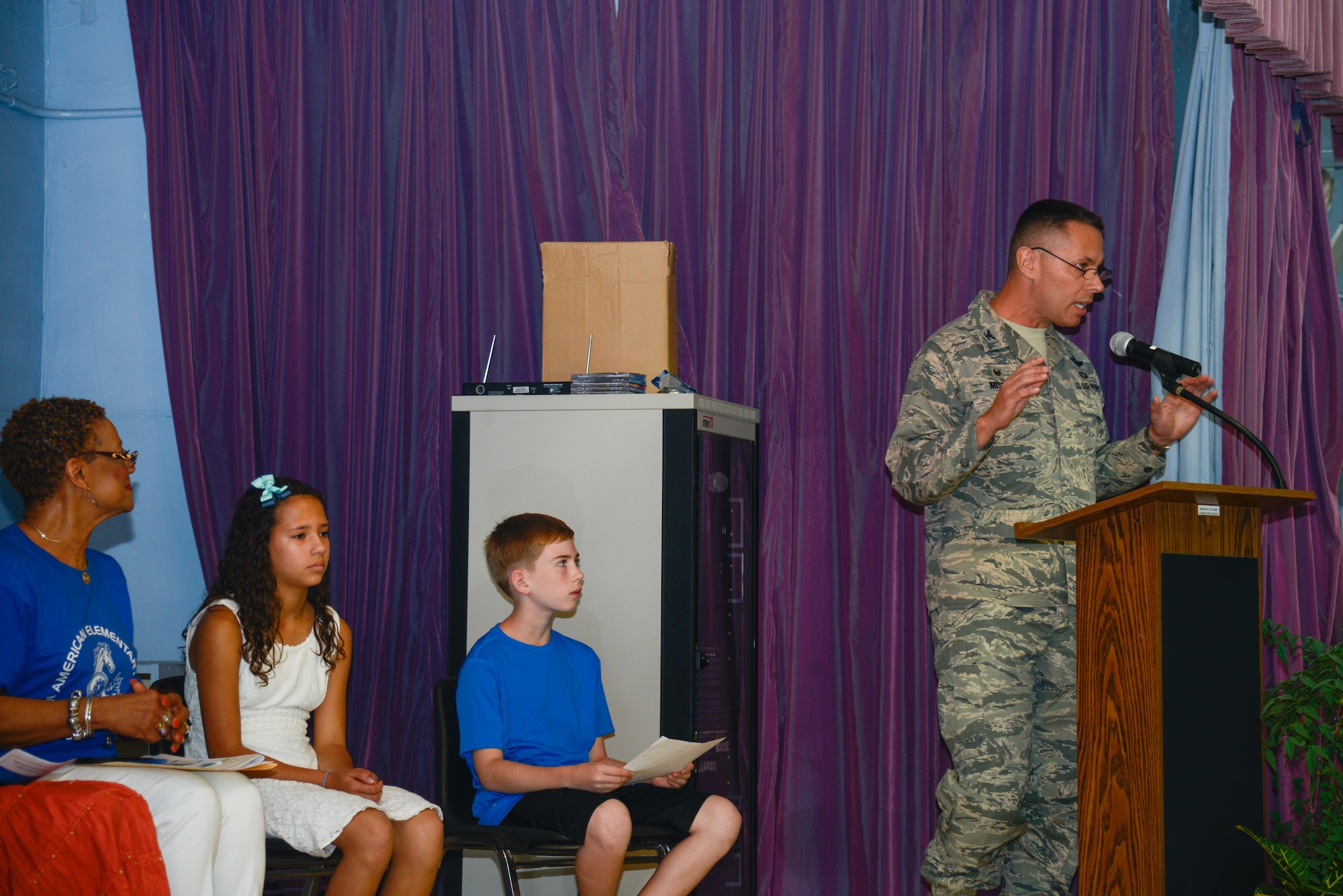 Col. Carl Misner, 51st Mission Support Group commander, speaks during the Osan Elementary School closing ceremony June 15, 2016, at Osan Air Base, Republic of Korea. Misner thanked the school faculty for teaching Osan’s youngest. (U.S. Air Force photo by Senior Airman Dillian Bamman/Released)