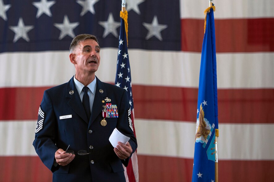 U.S. Air Force Chief Master Sgt. John Brinkley, 23d Maintenance Group superintendent, speaks to attendees during his retirement ceremony, June 10, 2016, at Moody Air Force Base, Ga. During his 30-year career, Brinkley deployed numerous times throughout Southwest Asia, serving at squadron, group and wing levels. (U.S. Air Force photo by Airman 1st Class Greg Nash/Released)