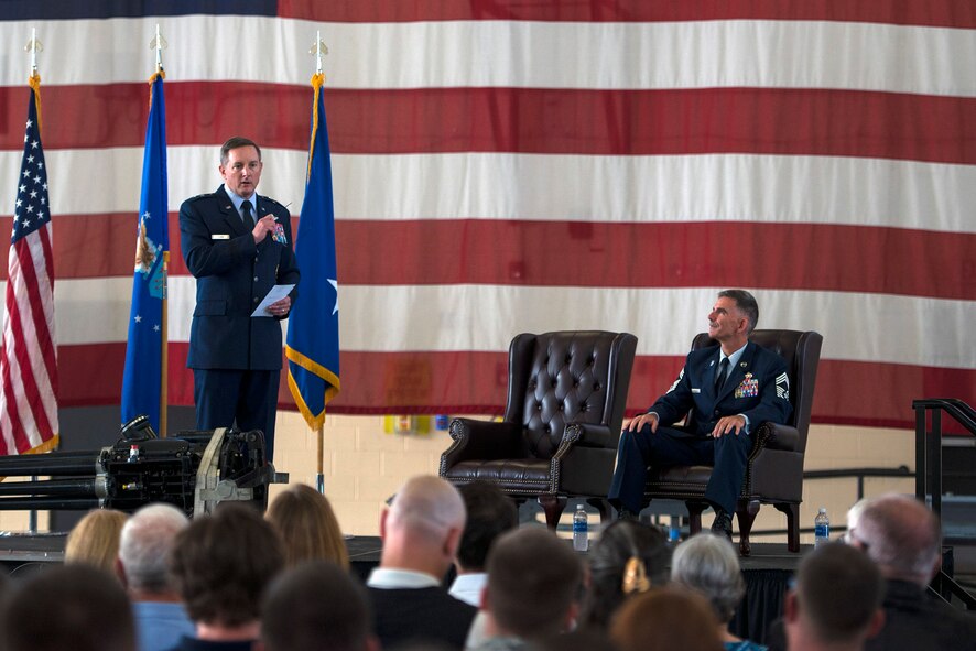 U.S. Air Force Maj. Gen. Stephen Clark, director for force structure, requirements, resources and strategic assessments (J8), Headquarters U.S. Special Operations Command, (left), talks during Chief Master Sgt. John Brinkley’s retirement ceremony, June 10, 2016, at Moody Air Force Base, Ga. As the 23d MXG superintendent, Brinkley contributed to the military readiness of over 2,400 personnel. (U.S. Air Force photo by Airman 1st Class Greg Nash/Released)
