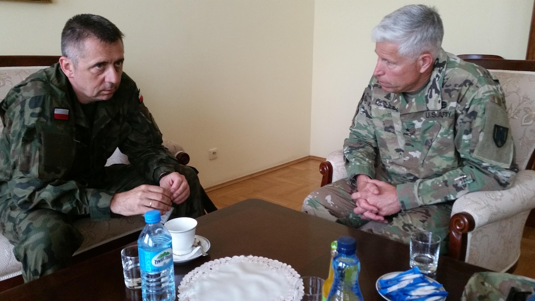 Polish Brig. Gen. Slawomir Wojiechowski, deputy commanding general of the Polish Armed Forces Operational Command, speaks with U.S. Army Brig. Gen. Arlan DeBlieck, commanding general of the 7th Mission Support Command and deputy commanding general of the 21st Theater Sustainment Command, during Exercise Anakonda 16 Thursday, June 2, 2016 at National Defense University in Warsaw, Poland. 