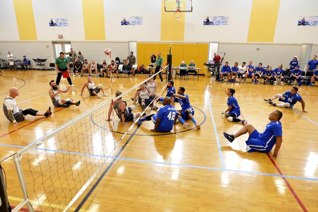 The Air Force sitting volleyball team competes against the U.S. Special Operations Command team during the 2016 Department of Defense Warrior Games at the U.S. Military Academy in West Point, N.Y., June 15, 2016. Air Force photo by Staff Sgt. Carlin Leslie
