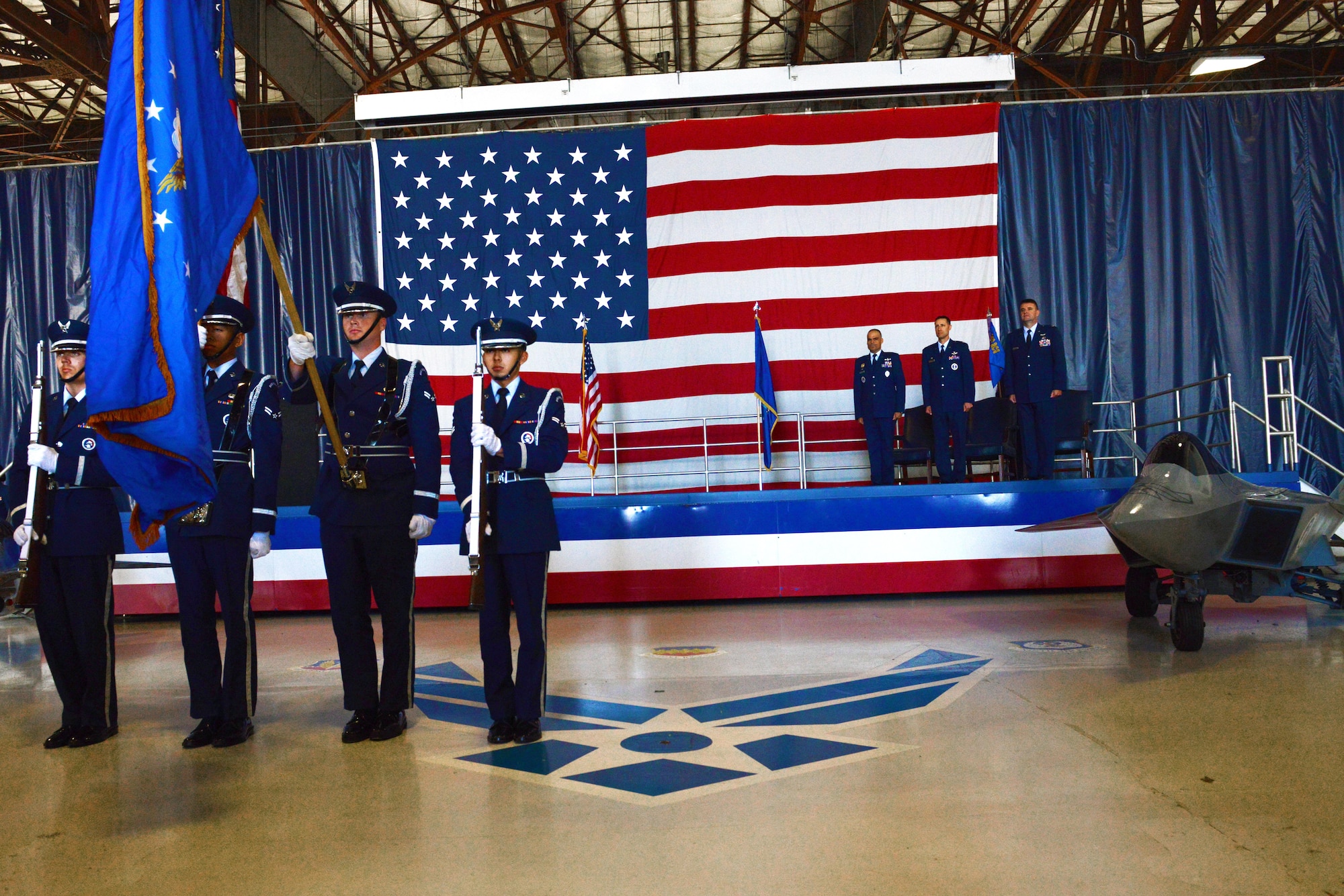 U.S. Airmen assigned to the 20th Force Support Squadron Honor Guard present the colors at the start of the 337th Recruiting Squadron change of command ceremony at Shaw Air Force Base, S.C., June 9, 2016. Change of command ceremonies signify the end of an era and the beginning of a new command. (U.S. Air Force photo by Airman 1st Class Destinee Dougherty)