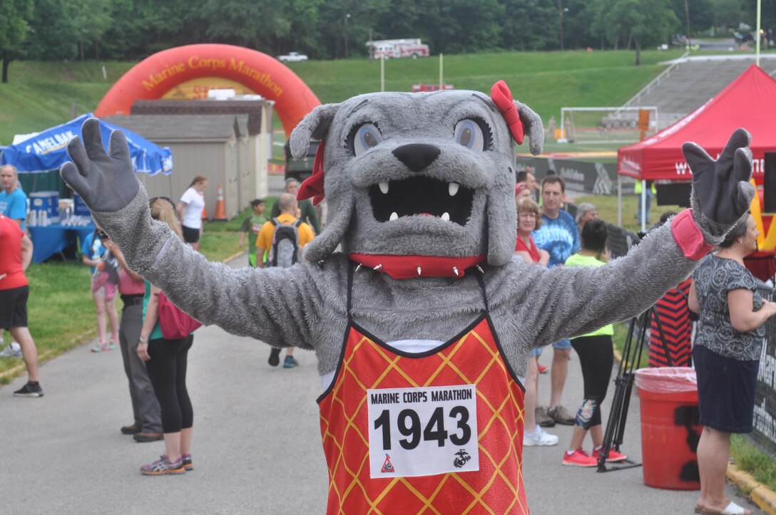 Mascot Molly greets participants during Run Amuck.