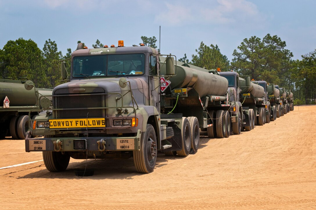 U.S. Army Reserve quartermaster Soldiers stage their M916 light equipment transporter trucks prior to fueling operations during the annual Quartermaster Liquid Logistics Exercise (QLLEX) at Fort Bragg, N.C., June 15, 2016. (U.S. Army photo by Staff Sgt. Dalton Smith/Released)