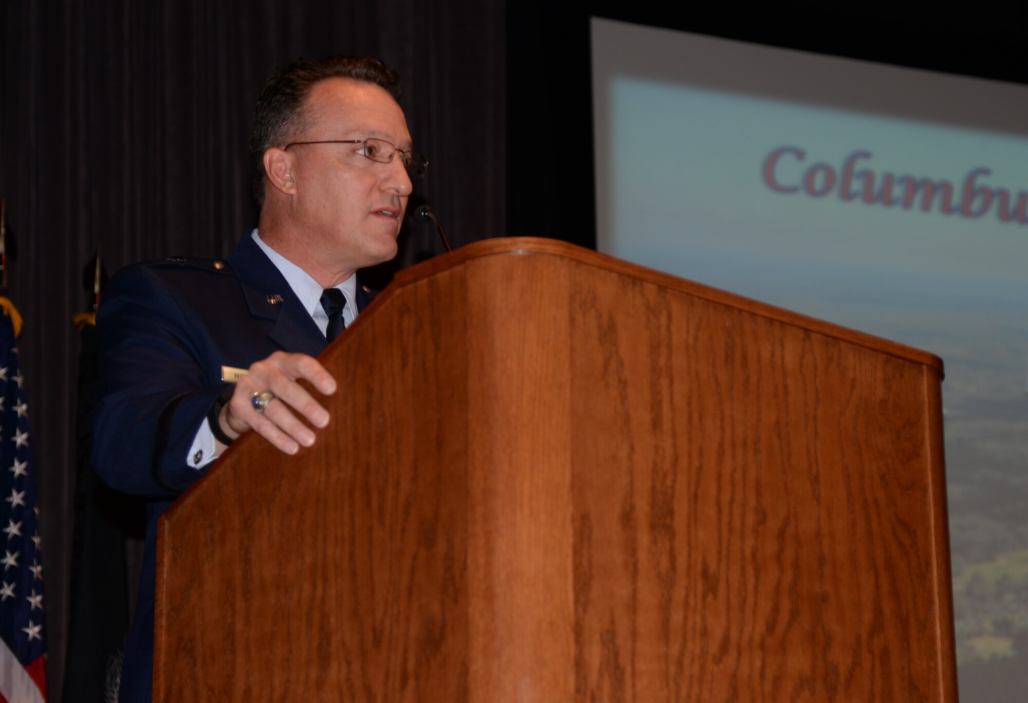 Brig. Gen. Patrick Mordente, 18th Air Force Vice Commander, Scott Air Force Base, Illinois, speaks at the Specialized Undergraduate Pilot Training Class 16-10 graduation June 10 at Columbus Air Force Base, Mississippi. Aside from being the keynote speaker at graduation, Mordente also came to celebrate 28 years from the exact day he graduated from UPT at Columbus AFB. (U.S. Air Force photo/Airman 1st Class John Day)