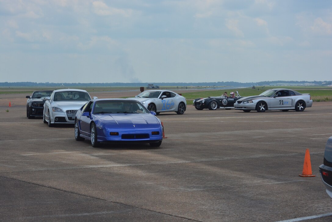 Columbus Air Force Base Autocross participants wait for the Autocross to start June 12 on the SAC Ramp at Columbus AFB, Mississippi. The Mississippi Region of the Sports Car Club of America holds the event on base several times a year. (U.S. Air Force photo/Master Sgt. Amanda Savannah)