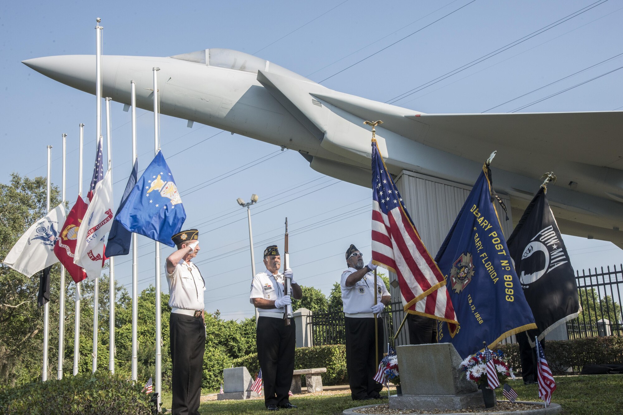 The honor guard from Veterans of Foreign Wars post 8093 presents the colors during an aircraft rededication ceremony June 14, 2016, at Memorial Park in DeBary Fla. The aircraft was rededicated in memory of Airman 1st Class Brian McVeigh, a member of the 33rd Fighter Wing, who was killed in the Khobar Towers terrorist attack in 1996. (U.S. Air Force photo by Senior Airman Stormy Archer/Released)