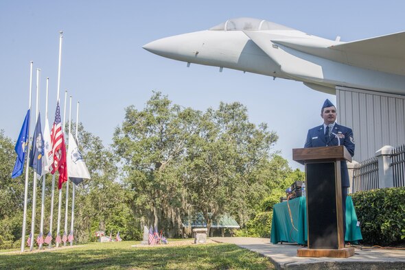 Tech. Sgt. Jody Mann, 33rd Aircraft Maintenance Squadron crew chief, speaks at an aircraft rededication ceremony June 14, 2016, at Memorial Park in DeBary Fla. The aircraft was rededicated in memory of Airman 1st Class Brian McVeigh, a member of the 33rd Fighter Wing, who was killed in the Khobar Towers terrorist attack in 1996. (U.S. Air Force photo by Senior Airman Stormy Archer/Released)