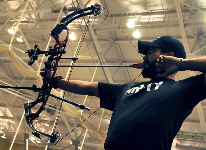 U.S. Army Veteran Staff Sgt. Eric Pardo draws a bead on the target during the Team Army archery training in preparation for the 2016 Department of Defense Warrior Games held at the United States Military Academy at West point, New York, June 13. The DoD Warrior Games, June 15-21, is an adaptive sports competition for wounded, ill and injured service members and Veterans. Athletes representing teams from the Army, Marine Corps, Navy, Air Force, Special Operations Command and the United Kingdom Armed Forces compete in archery, cycling, track, field, shooting, sitting volleyball, swimming, and wheelchair basketball. (US Army photo by Master Sgt. D. Keith Johnson/Released)