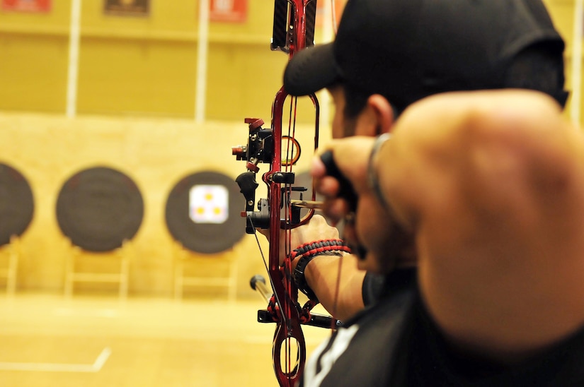 U.S. Army Veteran Staff Sgt. Eric Pardo takes aim during Team Army archery training in preparation for the 2016 Department of Defense Warrior Games held at the United States Military Academy at West point, New York, June 13. The DoD Warrior Games, June 15-21, is an adaptive sports competition for wounded, ill and injured service members and Veterans. Athletes representing teams from the Army, Marine Corps, Navy, Air Force, Special Operations Command and the United Kingdom Armed Forces compete in archery, cycling, track, field, shooting, sitting volleyball, swimming, and wheelchair basketball. (US Army photo by Master Sgt. D. Keith Johnson/Released)