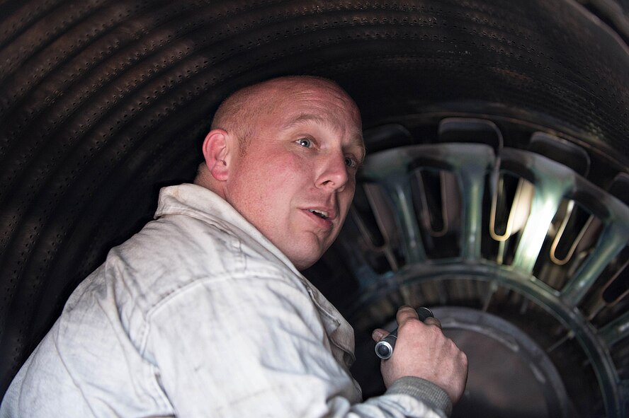 U.S. Air Force Staff Sgt. Theodore Lau, a 354th Aircraft Maintenance Squadron aerospace propulsion technician, inspects fins inside the exhaust of an F-16 Fighting Falcon fighter aircraft while working swing shift June 14, 2016, during RED FLAG-Alaska (RF-A) 16-2 at Eielson Air Force Base, Alaska. Jets are flown almost double the normal hours during RF-A, increasing the need for maintenance, which provides training for support personnel in sustainment of large-force deployed air operations. (U.S. Air Force photo by Staff Sgt. Shawn Nickel/Released)
