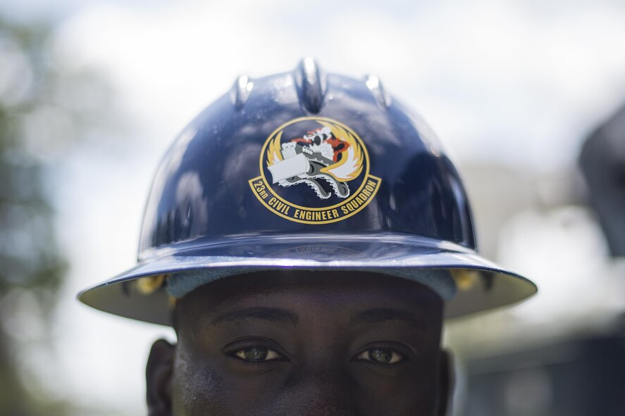 U.S. Air Force Airman Basic Ivener Alexi, 202nd Red Horse Squadron electrical systems apprentice, poses for a photograph, June 15, 2016, at Moody Air Force Base, Ga. The 202nd RHS trains with the 23d Civil Engineer Squadron to provide heavy damage repairs on Air Force facilities and utility systems. (U.S. Air Force photo by Airman Daniel Snider/Released)