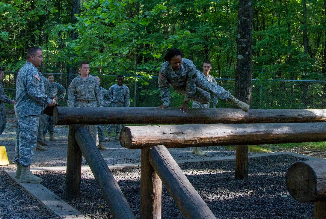 An Army Reserve instructor, attached to Task Force Wolf, monitors a cadet leadership course candidate on the confidence course during Cadet Summer Training at the U.S. Army Cadet Command, Ft. Knox, Ky., June 11. (U.S. Army Reserve photo by Sgt. Karen Sampson/ Released)