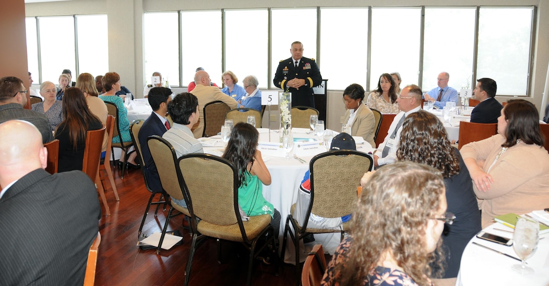 Brig. Gen. Jose Burgos, deputy commanding general of the Army Reserve’s 99th Regional Support Command, speaks with nearly two-dozen Army Reserve Soldiers and their families during a congressional roundtable discussion hosted by the U.S. Senate and House Military Family Caucuses during a Yellow Ribbon event June 10 at the Westin Tysons Corner Hotel in Falls Church, Va. The U.S. Senate and House Military Family Caucuses consist of senators and congressmen/women who want to work together for issues and policies that impact military families.