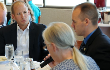 Michael Calcagni, congressional staff member for U.S. Rep. Sanford Bishop, left, listens to nearly two-dozen Army Reserve Soldiers and their families during a congressional roundtable discussion hosted by the U.S. Senate and House Military Family Caucuses during a Yellow Ribbon event June 10 at the Westin Tysons Corner Hotel in Falls Church, Va. The U.S. Senate and House Military Family Caucuses consist of senators and congressmen/women who want to work together for issues and policies that impact military families.