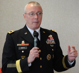 Maj. Gen. Michael Smith, acting chief, Army Reserve, speaks with nearly two-dozen Army Reserve Soldiers and their families during a congressional roundtable discussion hosted by the U.S. Senate and House Military Family Caucuses during a Yellow Ribbon event June 10 at the Westin Tysons Corner Hotel in Falls Church, Va. The U.S. Senate and House Military Family Caucuses consist of senators and congressmen/women who want to work together for issues and policies that impact military families.