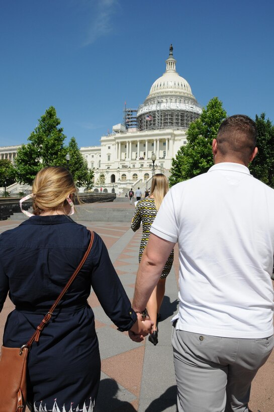 Nearly two-dozen Army Reserve Soldiers and their families participate in a tour of Capitol Hill following a congressional roundtable discussion hosted by the U.S. Senate and House Military Family Caucuses during a Yellow Ribbon event June 10 at the Westin Tysons Corner Hotel in Falls Church, Va. The U.S. Senate and House Military Family Caucuses consist of senators and congressmen/women who want to work together for issues and policies that impact military families.