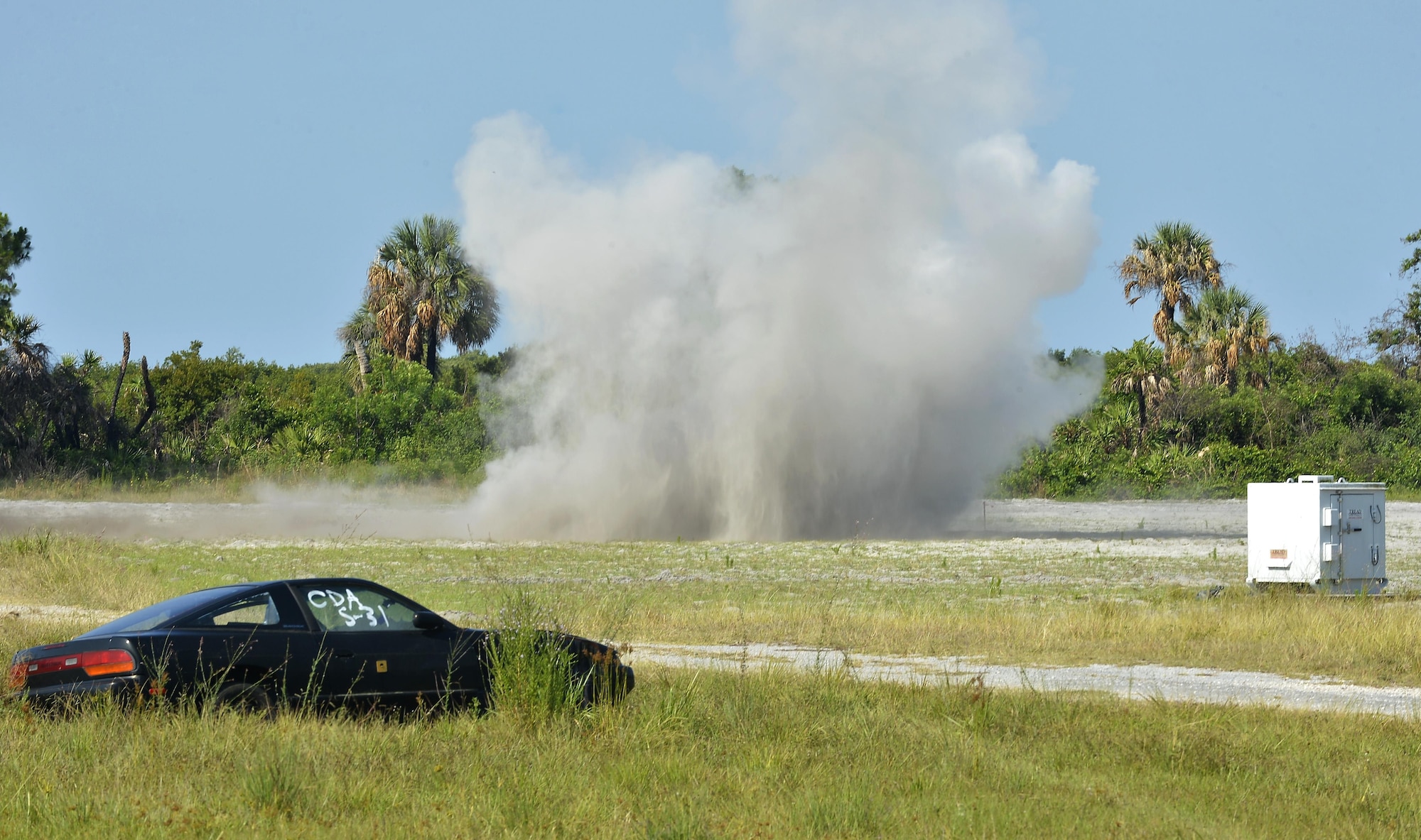 Members of the 6th Civil Engineer Squadron (CES) and Transportation Security Administration (TSA) detonate various improvised explosive devices (IED) at MacDill Air Force Base, Fla., June 1, 2016. The 6th CES partnered with TSA to demonstrate the various explosive capabilities and impacts of IEDs. (U.S. Air Force photo by Staff Sgt. Shandresha Mitchell)