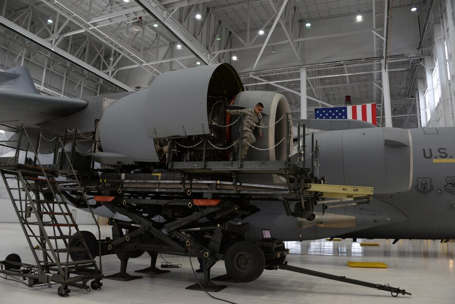 An Airman assigned to the 860th Aircraft Maintenance Squadron, works on a C-17 Globemaster III engine inside a hangar at Travis Air Force Base, Calif., June 15, 2016. The 860th AMXS is responsible for maintaining more than a dozen C-17's valued at $2.9 billion. Photo altered for security reasons. (U.S. Air Force photo by Tech. Sgt. James Hodgman)