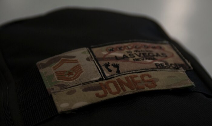 A bag rests on the hangar floor of the 823rd Maintenance Squadron at Nellis Air Force Base, Nev. Approximately 80 Airmen from the 66th Rescue Squadron and the 823rd Maintenance Squadron returned from a four month deployment in Afghanistan, 43 of which were maintainers. (U.S. Air Force Photo by Senior Airman Rachel Loftis)