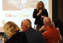 Betina Johnson, Huntsville Center's Military Munitions Design Center chief, briefs members of the National Association of Ordnance Contractors during their mid-year board of director’s meeting in Huntsville, Alabama, June 8. 