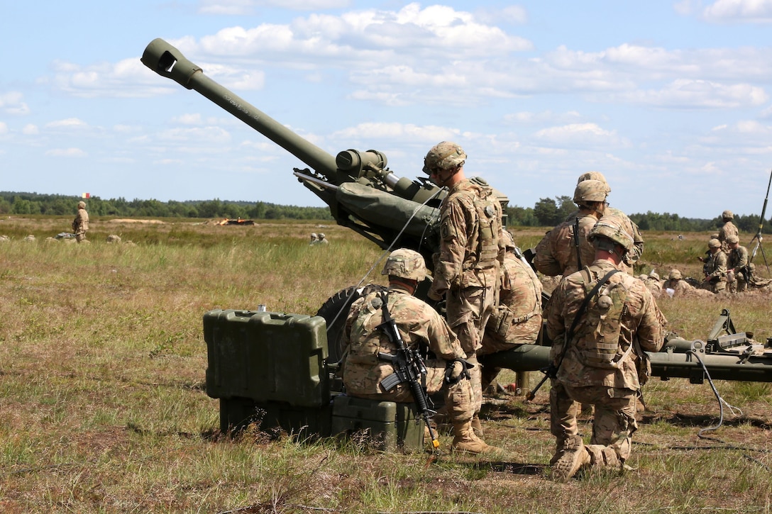 U,S. paratroopers prepare to fire an M777 howitzer during Anakonda 2016 in Drawsko Pomorskie, Poland, June 6, 2016. Army photo by Spc. Jacquelynn Gaines