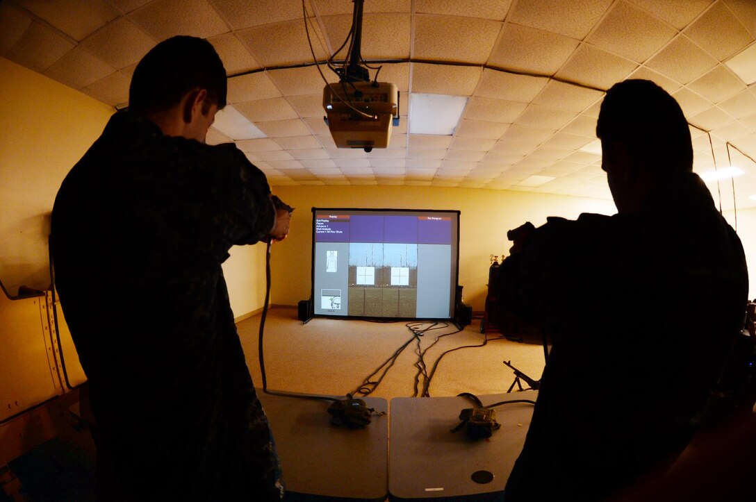 Shooters aim at simulated targets using Marine Corps Logistics Base Albany’s Indoor Simulated Marksmanship Trainer, recently.