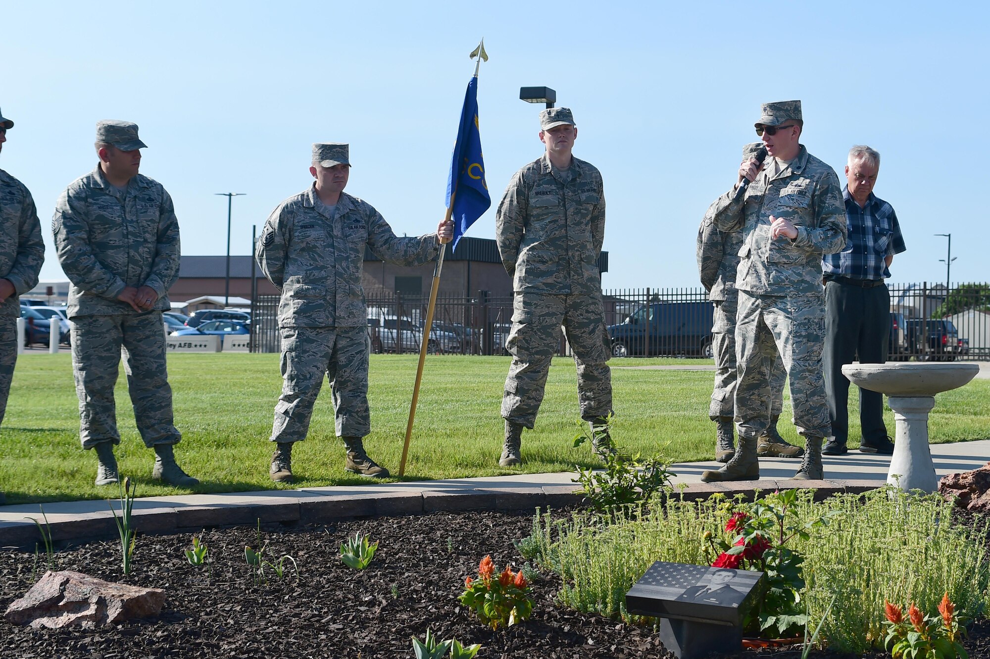 Lt. Col. Christopher Kennedy, 460th Space Communication Squadron, speaks at the Senior Airman Michael S. Snyder memorial June 16, 2016, on Buckley Air Force Base, Colo. Each year, Team Buckley members get together for the Snyder Ride, which is a remembrance ride to honor Snyder, who was killed on his motorcycle in 2014 by a drunk driver. (U.S. Air Force photo by Airman 1st Class Luke W. Nowakowski/Released)