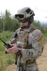 U.S. Air Force Staff Sgt. Stephan Mynatt II, a joint tactical air controller (JTAC) assigned to the 13th Air Support Operations Squadron, Fort Carson, Colo., receives a radio call during RED FLAG-Alaska (RF-A) 16-3, June 13, 2016, at the Joint Pacific Alaska Range Complex, Alaska. A JTAC’s job is to point close-air support to its target, assisting ground troops in accomplishing their mission safely. (U.S. Air Force photo by Staff Sgt. Ashley Nicole Taylor/Released)