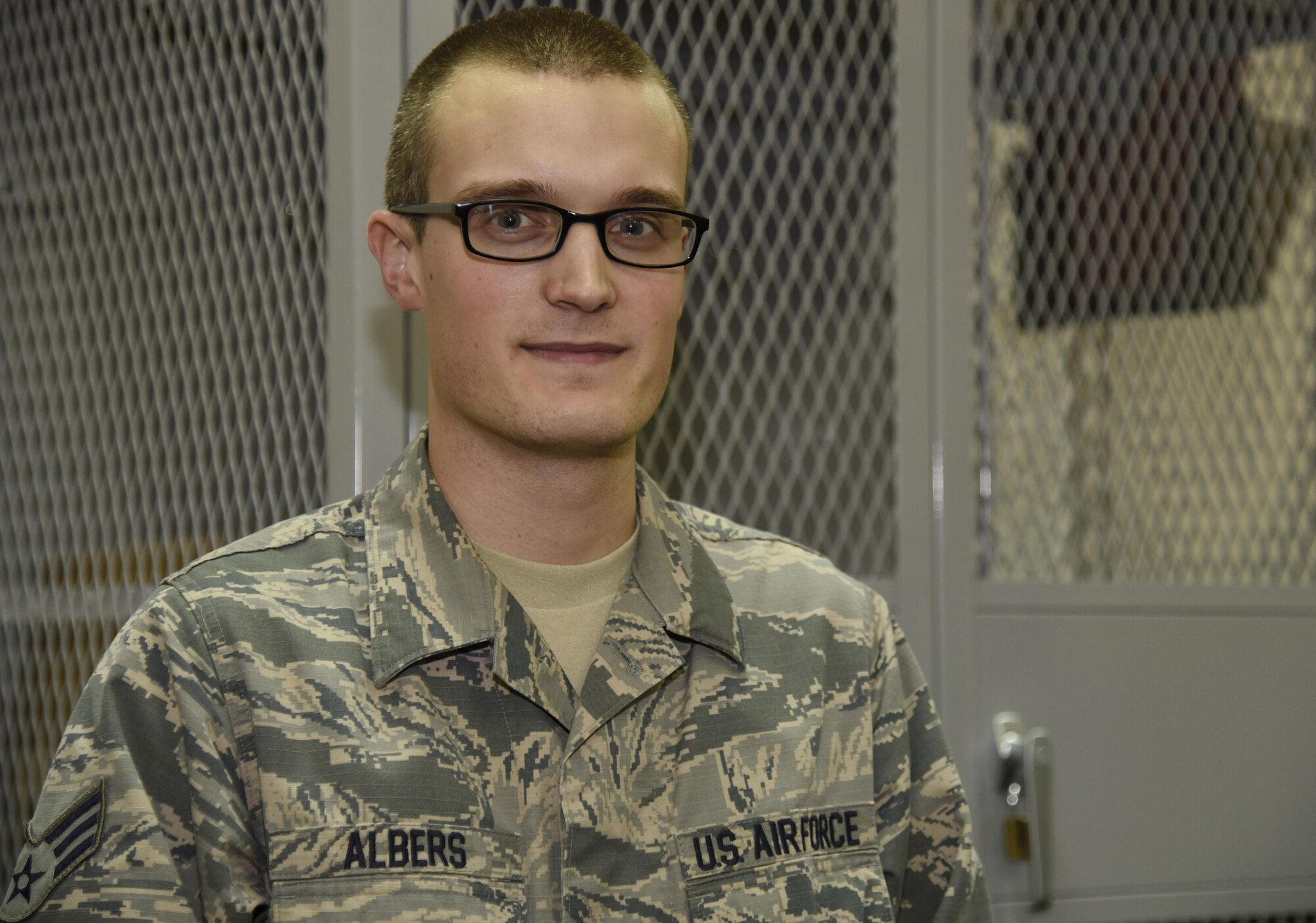 U.S. Air Force Senior Airman Benjamin Albers, a contracting specialist with the 35th Contracting Squadron, poses for a photo portrait at Misawa Air Base, Japan, June 15, 2016. Albers was recognized as the Wild Weasel of the Week by the 35th CONS for his superior performance, outstanding work ethic, and overall good conduct and discipline. Albers is from Rochester, Minnesota. (U.S. Air Force photo by Airman 1st Class Jordyn Fetter)