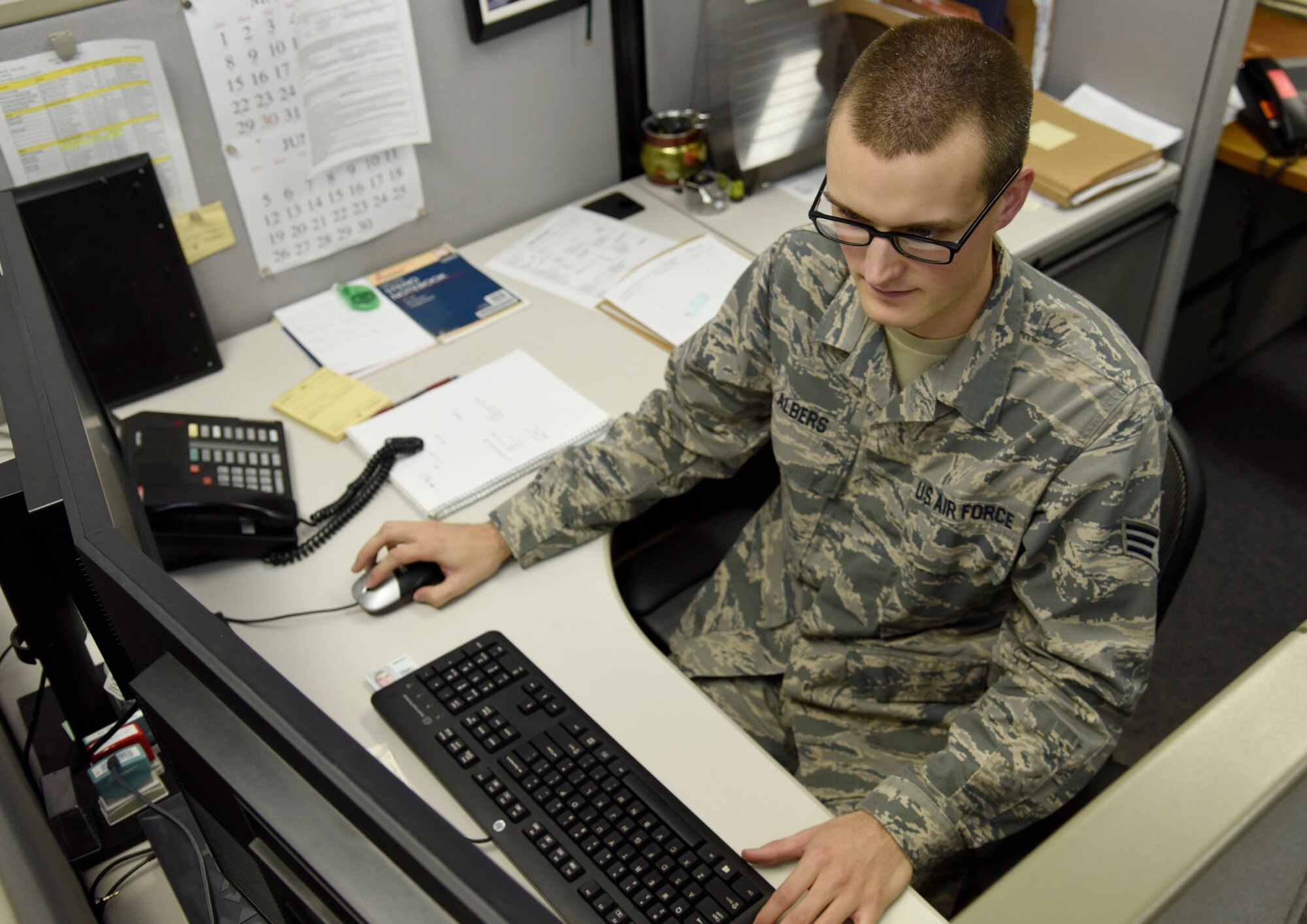 U.S. Air Force Senior Airman Benjamin Albers, a contracting specialist with the 35th Contracting Squadron, completes solicitations at Misawa Air Base, Japan, June 15, 2016. Solicitations are requests for work the 35th CONS inputs into the Federal Business Opportunity database. The requests specify the needs and terms of the work to be done and are then reviewed by contracting specialists to ensure federal laws are upheld in the process. Albers hails from Rochester, Minnesota. (U.S. Air Force photo by Airman 1st Class Jordyn Fetter)