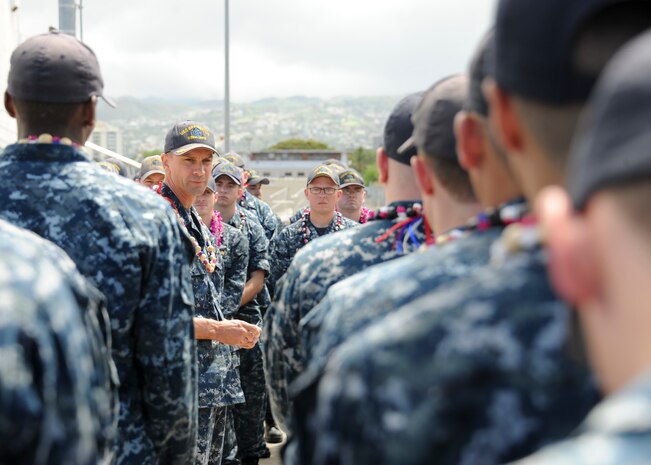 160615-N-LY160-104

PEARL HARBOR (June 15, 2016) Cmdr. Wes Bringham, commanding officer of the Los Angeles-class fast-attack submarine USS Bremerton (SSN 698), addresses the crew during an all-hands call pierside in Joint Base Pearl Harbor-Hickam. Bremerton returned home to Pearl Harbor after successfully completing a six-month deployment to the Western Pacific Ocean June 14. (U.S. Navy photo by Mass Communication Specialist 2nd Class Michael H. Lee/Released)