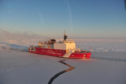 The Kigluaik Mountains are visible as the Coast Guard Cutter Healy breaks ice for the Russian tanker Renda near Nome Jan. 13, 2012. The Healy and crew are approximately seven nautical miles away from Nome. (U.S. Coast Guard photo by Petty Officer 2nd Class Charly Hengen/Released)