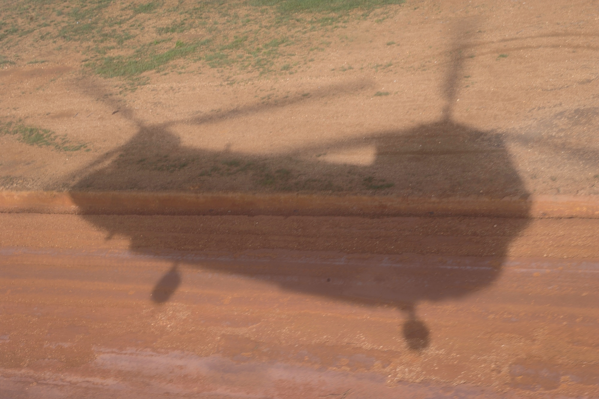 A CH-47 Chinook helicopter prepares to land during the twentieth iteration of Operation CARAVANA, in Mocorón, Honduras, June 9, 2016. Since its initiation, CARAVANA has facilitated the movement of more than 5,000 troops and 225,000 pounds of cargo between remote locations in the eastern part of Honduras, giving the Honduran security teams the ability to quickly focus and adjust their forces against the ever-changing tactics Transnational Criminal Organizations use in the region. (U.S. Air Force photo by Staff Sgt. Siuta B. Ika)