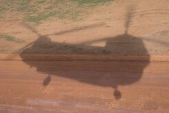 A CH-47 Chinook helicopter prepares to land during the twentieth iteration of Operation CARAVANA, in Mocorón, Honduras, June 9, 2016. Since its initiation, CARAVANA has facilitated the movement of more than 5,000 troops and 225,000 pounds of cargo between remote locations in the eastern part of Honduras, giving the Honduran security teams the ability to quickly focus and adjust their forces against the ever-changing tactics Transnational Criminal Organizations use in the region. (U.S. Air Force photo by Staff Sgt. Siuta B. Ika)
