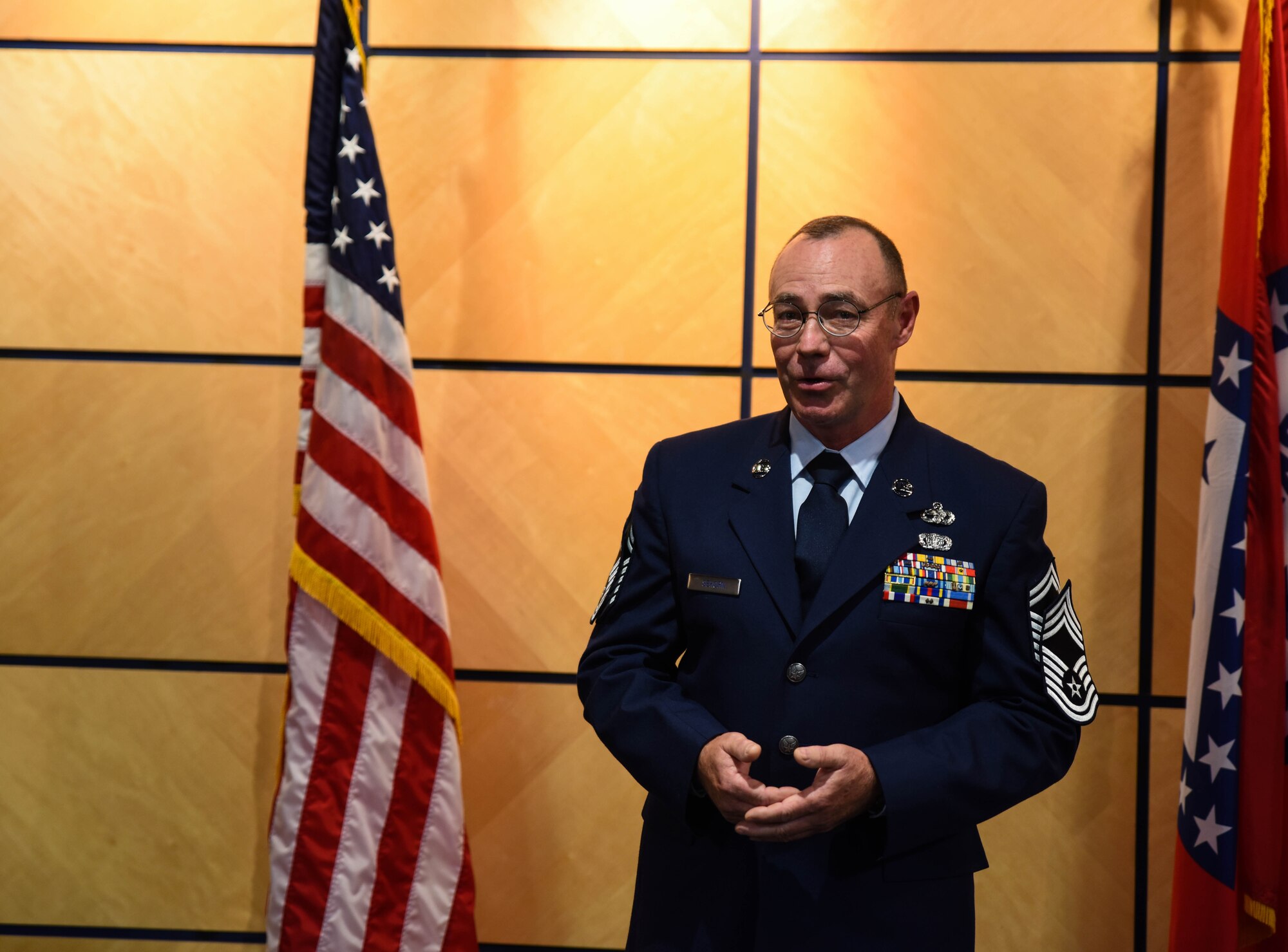 Chief Master Sgt. Ricky Sehorn, chief of transportation, speaks to Airmen in attendance June 4, 2016, during his promotion ceremony at Ebbing Air National Guard Base, Fort Smith, Ark. Sehorn has served in vehicle maintenance for the past 24 years and has been chief of transportation since 2014. (U.S. Air National Guard photo by Senior Airman Cody Martin/Released)