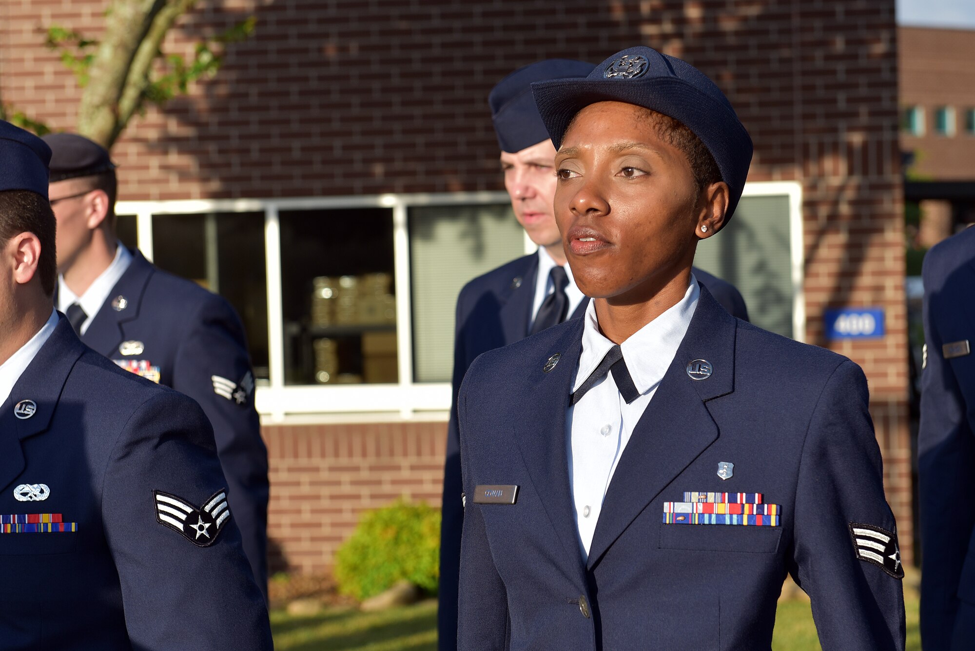 Airmen hold reveille in the sunrise during Airman leadership school at the Chief Master Sergeant Paul H. Lankford Enlisted Professional Military Education Center, June 16, 2016, on McGhee Tyson Air National Guard Base in Louisville, Tenn. (U.S. Air National Guard photo by Master Sgt. Mike R. Smith/Released)