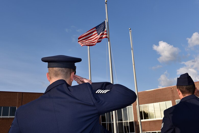 Airmen hold reveille in the sunrise during Airman leadership school at the Chief Master Sergeant Paul H. Lankford Enlisted Professional Military Education Center, June 16, 2016, on McGhee Tyson Air National Guard Base in Louisville, Tenn. (U.S. Air National Guard photo by Master Sgt. Mike R. Smith/Released)