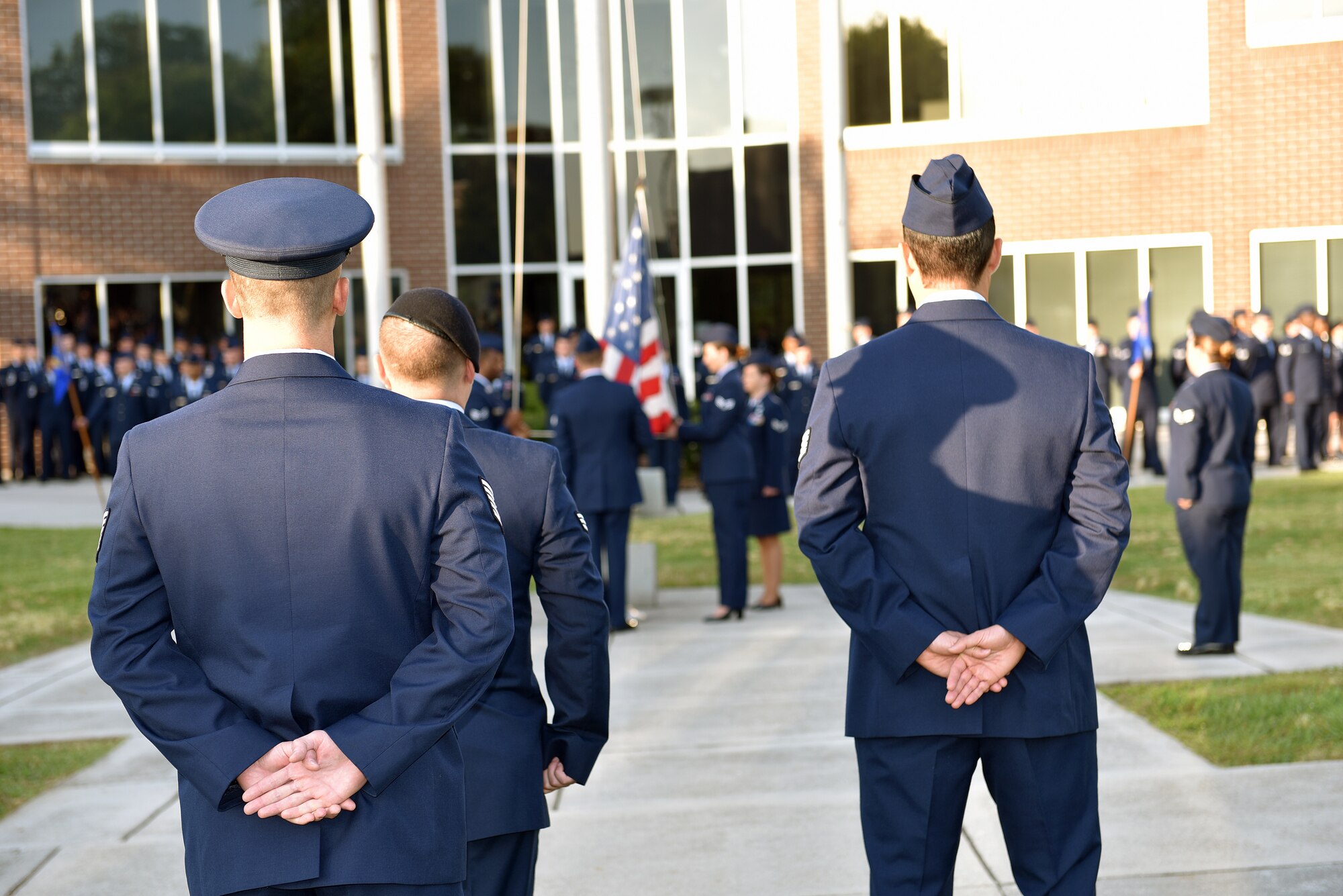 Airmen hold reveille in the sunrise during Airman leadership school at the Chief Master Sergeant Paul H. Lankford Enlisted Professional Military Education Center, June 16, 2016, on McGhee Tyson Air National Guard Base in Louisville, Tenn. (U.S. Air National Guard photo by Master Sgt. Mike R. Smith/Released)