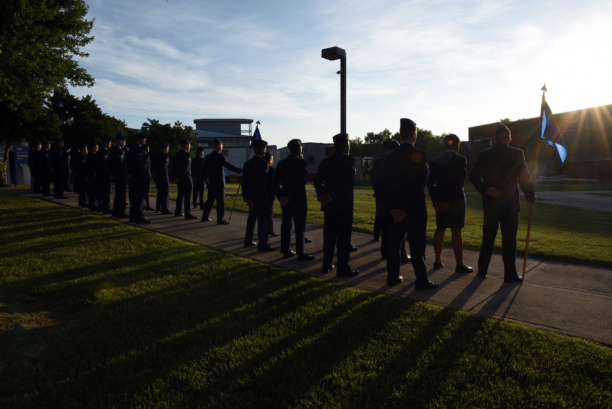 Airmen hold reveille in the sunrise during Airman leadership school at the Chief Master Sergeant Paul H. Lankford Enlisted Professional Military Education Center, June 16, 2016, on McGhee Tyson Air National Guard Base in Louisville, Tenn. (U.S. Air National Guard photo by Master Sgt. Mike R. Smith/Released)