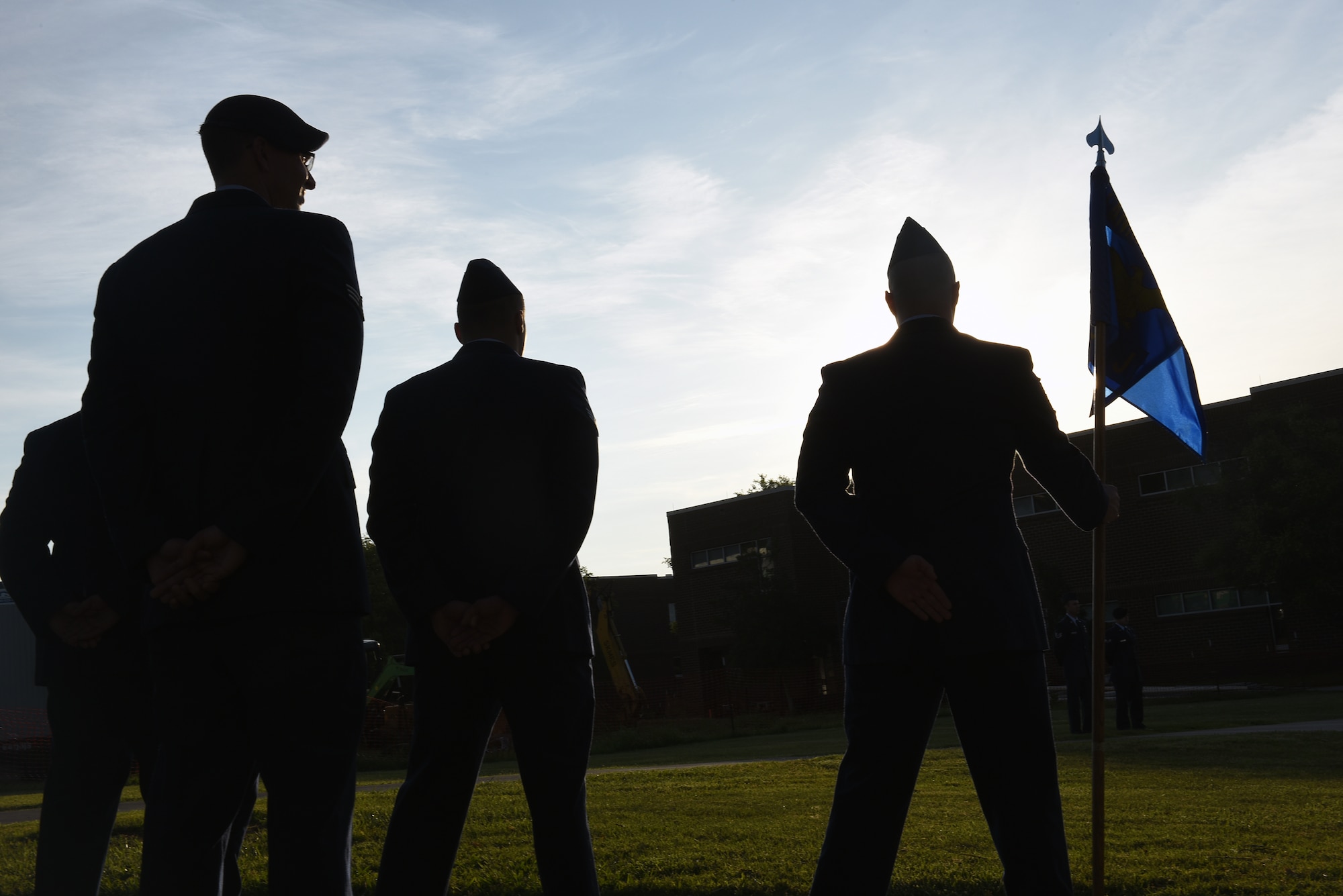 Airmen hold reveille in the sunrise during Airman leadership school at the Chief Master Sergeant Paul H. Lankford Enlisted Professional Military Education Center, June 16, 2016, on McGhee Tyson Air National Guard Base in Louisville, Tenn. (U.S. Air National Guard photo by Master Sgt. Mike R. Smith/Released)