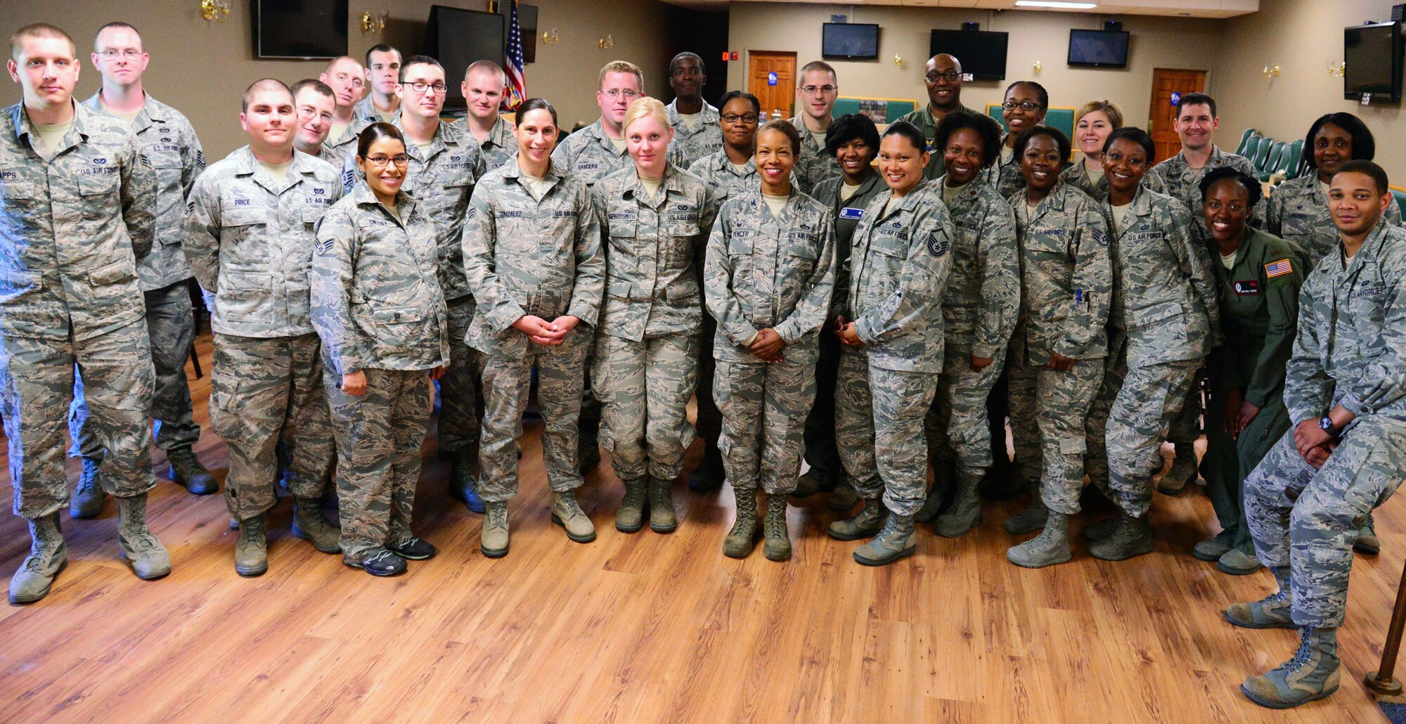 Col. Yvonne Spencer, 819th RED HORSE Squadron commander, center, poses for a photo with Airmen from the 341st Missile Wing and 819th RED HORSE Squadron at the Ace’s High Bowling Center June 16, 2016, at Malmstrom Air Force Base, Mont. Spencer was the guest speaker at the 341st MW Diversity Lean In Circle event, where she spoke on her experiences as a military officer. (U.S. Air Force photo/Airman 1st Class Magen M. Reeves)