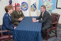 Marine Corps Gen. Joe Dunford, chairman of the Joint Chiefs of Staff, and Air Force Gen. Lori J. Robinson, commander of U.S. Northern Command and North American Aerospace Defense Command, speak with Defense Secretary Ash Carter at Peterson Air Force Base, Colo., May 13, 2016. Robinson provided remarks at the United State of Women Summit in Washington, D.C., June 14, 2016. DoD photo by Navy Petty Officer 2nd Class Dominique A. Pineiro
