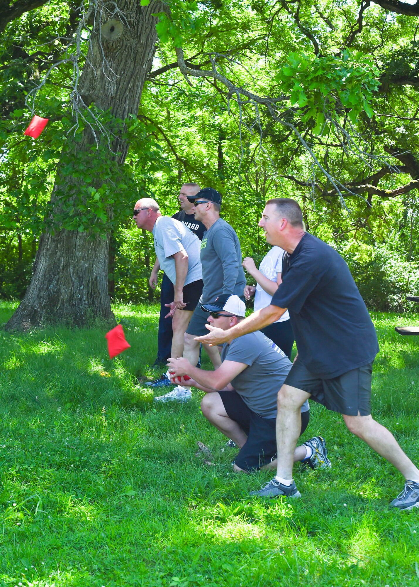 132nd Intelligence Surveillance and Reconnaissance Group toss bean bags June 6, 2016, at Moffitt Resevoir Park in Cumming, Iowa.The ISRG held an amazing race event to kickstart Annual Training Week. (U.S. Air National Guard photo by Staff Sgt. Michael J. Kelly/Released)