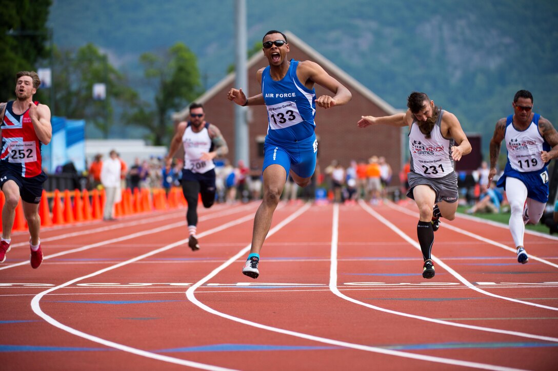 Air Force veteran Trent Smith crosses the finish line first in a men’s 100-meter dash competition during the 2016 Department of Defense Warrior Games at the U.S. Military Academy in West Point, N.Y., June 16, 2016. DoD photo by EJ Hersom