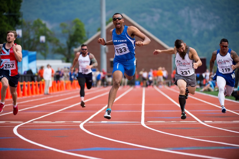 Air Force veteran Trent Smith crosses the finish line first in a men’s 100-meter dash competition during the 2016 Department of Defense Warrior Games at the U.S. Military Academy in West Point, N.Y., June 16, 2016. DoD photo by EJ Hersom