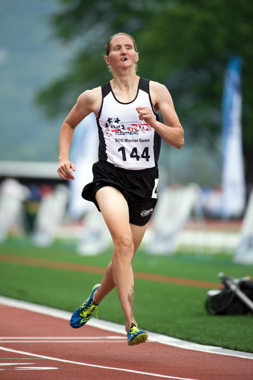 Army veteran Katie Kuiper runs track during the 2016 Department of Defense Warrior Games at the U.S. Military Academy in West Point, N.Y., June 16, 2016. DoD photo by EJ Hersom