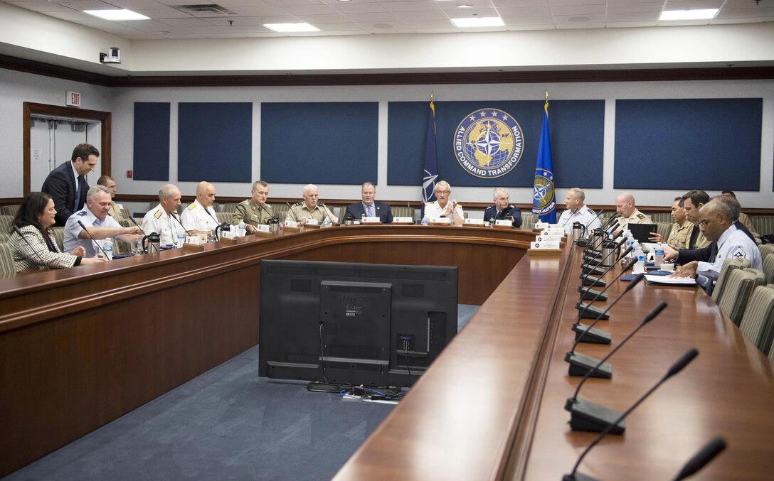 Deputy Defense Secretary Bob Work, left, German navy Admiral Manfred Nielson, center, Deputy Supreme Allied Commander Transformation, and Air Force Gen. Paul J. Selva, vice chairman of the Joint Chiefs of Staff, meet with senior leaders at NATO Supreme Allied Command Transformation in Norfolk, Va., June 16, 2016. DoD photo by Navy Petty Officer 1st Class Tim D. Godbee 