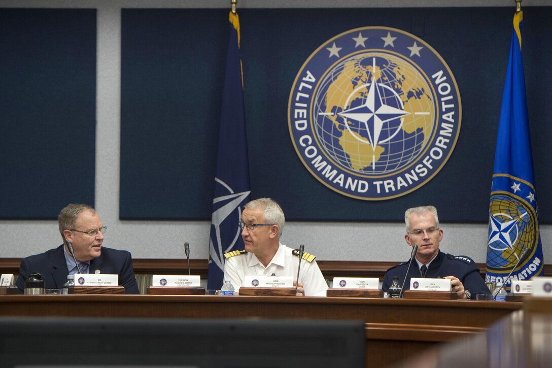 Deputy Defense Secretary Bob Work, left, German navy Admiral Manfred Nielson, Deputy Supreme Allied Commander Transformation, center, and Air Force Gen. Paul J. Selva, vice chairman of the Joint Chiefs of Staff, meet with senior leaders at NATO Supreme Allied Command Transformation in Norfolk, Va., June 16, 2016. DoD photo by Navy Petty Officer 1st Class Tim D. Godbee 