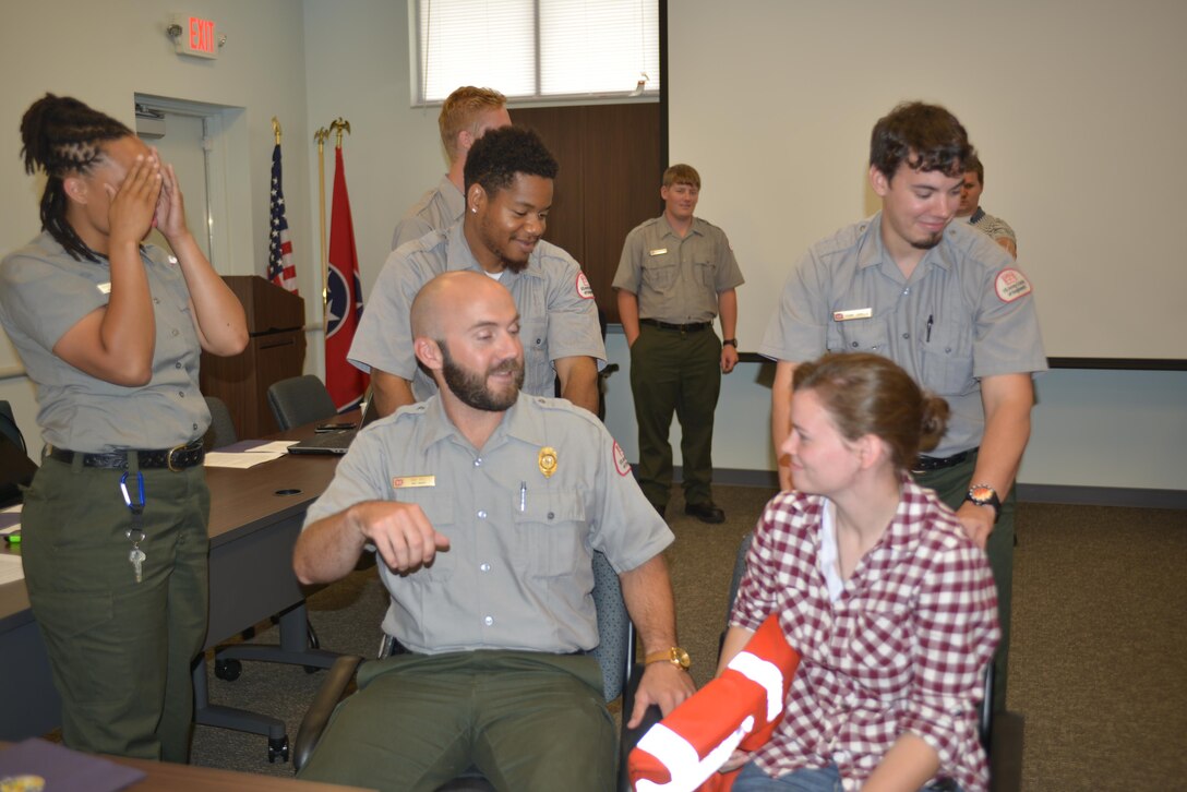 A group of U.S. Army Corps of Engineers Nashville District park rangers from the Nashville District demonstrate a mock water situation in a boat on the water during a water safety refresher class at the Cordell Hull Dam resource managers office Jun. 3, 2016.